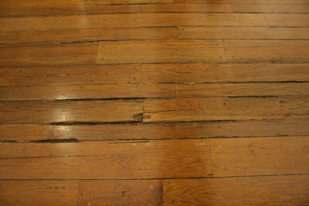 Close view of warm, polished hardwood floor boards